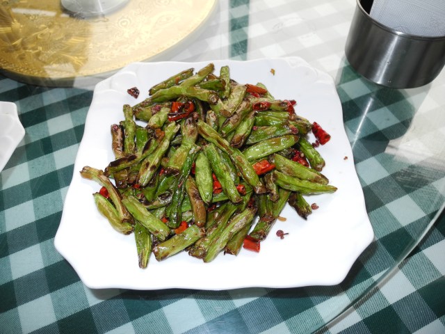 Best thing yet, crispy snap peas Szechuan style with peppers and peppercorns that will make your tongue tingle